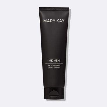 Bottle of MKMen Moisturizing Shave Cream standing on its cap against a plain background