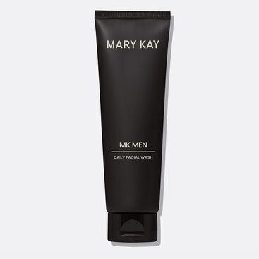 Bottle of MKMen Daily Facial Wash standing on its cap against a plain background
